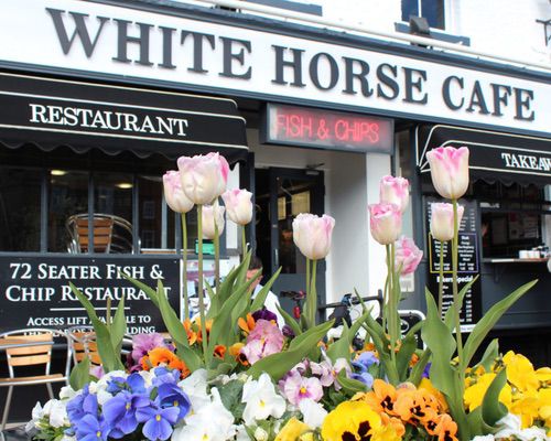At White Horse Cafe specialises in freshly cooked fish and chips fried the traditional Yorkshire way in beef dripping.
