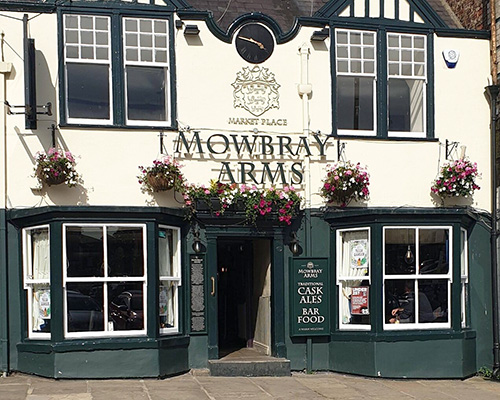 One of the oldest buildings in Thirsk, built in the early 1500s. We aim to provide a lovely warm atmosphere, with freshly cooked food from locally sourced ingredients. We have live entertainment every Friday and Sunday and a disco every Saturday. You can sit with a quiet drink in the window and watch the local ducks waddle past every night. Ian, Claire and all of our staff are always here to welcome you with a smile and a conversation about anything you would like to talk about.